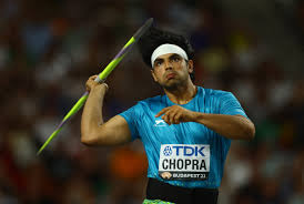 chopra wins india s first gold at world