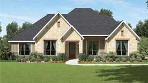 This sprawling home features three separated living quarters. The Rockwall Custom Home Plan From Tilson Homes