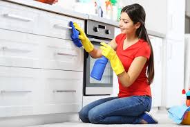 how to clean kitchen cabinets the maids