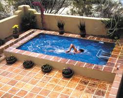 An indoor pool is quickly becoming popular a popular addition to homes. Small Indoor Pool House Designs