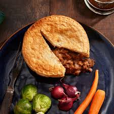 steak pies with puff pastry in