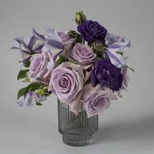 When given to a lover, a purple flower carries a message of majesty or enchantment. Lavender Romance Vintage Styled Roses Clematis Lisianthus