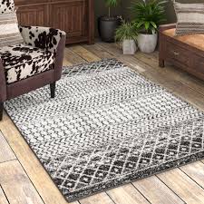 Traditional patterns, like persian, will give the room a more formal feel, while contemporary styles, like boho and farmhouse, will give your space a more relaxed. 9 X 12 Rustic Lodge Area Rugs You Ll Love In 2021 Wayfair