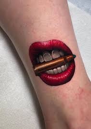 bullet lips tattoo tat2o