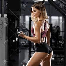 Sexy Athletic Girl Workout In Gym. Sexy Buttocks In Thong. Fitness Woman  Doing Exercise Stock Photo, Picture and Royalty Free Image. Image 117166918.