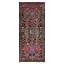 hand knotted worn wool rug