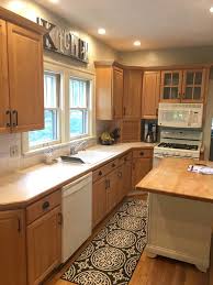 I don't feel the need to paint the cabinets to get that same modern balance we feel looks fresh today. Kitchen Remodel Without Painting Cabinets
