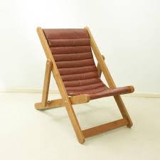 Folding adult sized wood sling chair, also known as wood beach chairs or deck chairs. Modern Leather And Oak Deck Chair At 1stdibs