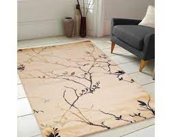 designer carpet in beige color by stories