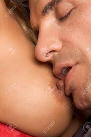 Sexuality Series. Sensual Couple, Man Arousing His Lover Or Wife By Oral  Stimulation Of Her Boobs (nipple And Lips Are Out Of Focus!) Stock Photo,  Picture and Royalty Free Image. Image 5645259.