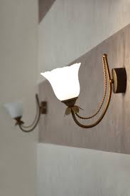 Two Electric Wall Lights Hang On The