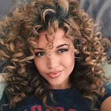 But there's one thing that even the wildest waves, springiest curls, and bounciest coils can agree on: Long Big Curly Hair Novocom Top