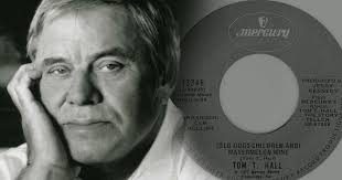 E e7 a f#m i had to catch a plane up to atlanta the next day b7 a b7 e as i left for my room i saw him picking up my change e e7 a f#m that night i dreamed in peaceful sleep of shady summer times. Tom T Hall His Life Stories In Old Dogs Children And Watermelon Wine