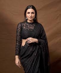 black sheer saree and lace blouse