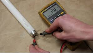 a fluorescent light bulb with a multimeter