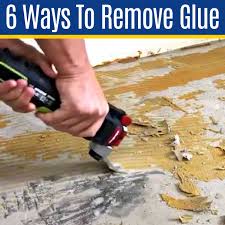 remove adhesive on concrete floors