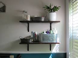 Floating wooden shelves are a good idea for the bathroom. Bathroom Shelf Decorating Ideas Best Decoratorist 6940