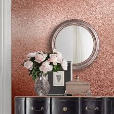 Rose colors in combination with golden materials has become quite popular lately. Muriva Oriah Textured Sparkle Bling Rose Gold Glitter Wallpaper 401012