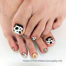 cow pattern pedicure nail art