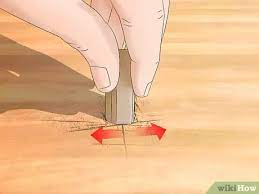 The easiest way is to colour them in! 3 Simple Ways To Fix Deep Scratches In Wood Wikihow