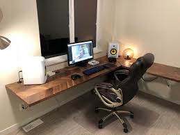 Floating desks have no legs because they're attached to the wall. New Floating Desk Album On Imgur