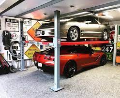 Challenger lifts' sa10 features the ability to be configured in either the symmetric or asymmetric position dependant upon the service requirements of your shop. 4 Post Car Lifts By Advantage Lifts Superior Design For Work And Storage
