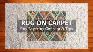 can you put a rug on carpet
