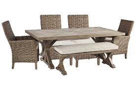 Available in white or grey, the domayne exclusive table has a style that can fit with any outdoor space and features a large top perfect for entertaining guests. Beachcroft Outdoor Dining Table And 4 Chairs And Bench Ashley Furniture Homestore