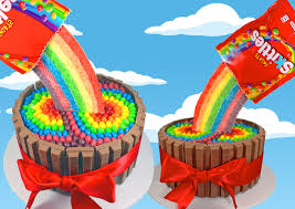 skittles poke cake with skittles