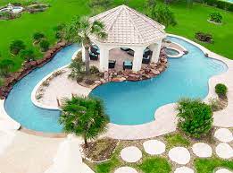 A lazy river pool is a water ride commonly found in water parks, hotels, resorts, and recreation centers. Lazy Rivers A Trend In Custom Designed Pools Platinum Pools