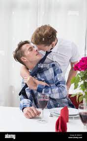 Homosexual couple holding wine glass hi-res stock photography and images -  Alamy