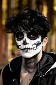 boy with skull makeup free stock photo