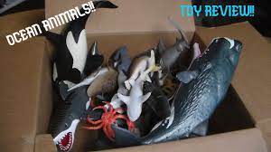box of toy ocean s whales