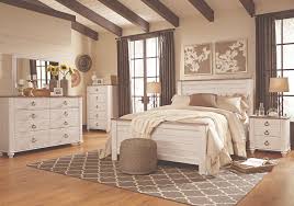 Cottage homes can be found anywhere in the world, even seaside. Willowton Two Tone White And Brown Casual Bedroom Furniture Set Xo Ashley