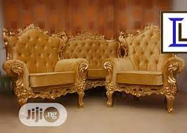 set of royal chairs with golden fabric