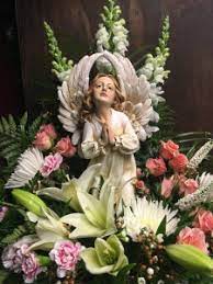 Maybe you would like to learn more about one of these? Kneeling Angel Arrangement Sympathy Arrangement Funeral Flowers In Mckees Rocks Pa The Bloomin Bar By Muetzel S Florist