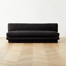 plinth modern armless black boucle sofa