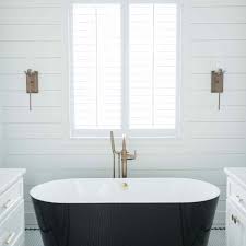 At the tub connection, you will find double slipper tubs for sale as long as 80 inches and as wide as 34 inches. 20 Stunning Black And White Bathrooms That Will Never Go Out Of Style