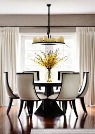Design a contemporary dining space with our modern round dining room tables and sets with chairs. Round Dinette Sets Dining Room Transitional With Candelabra Candle Chandelier Contemporary Furniture Round Dining Room Modern Dining Room Circular Dining Room