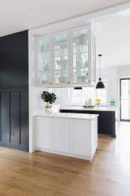 The Upper Cabinets Feature Glass Doors