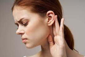 headache behind the ears causes