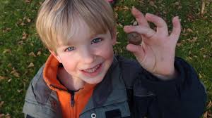 Image result for Picture of a little boy giving away a rock as a gift