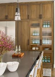 brown wood kitchen cabinets with
