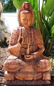 Serene Hand Carved Guan Yin Statue From
