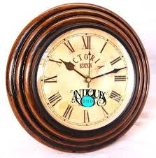 year wooden victoria station wall clock