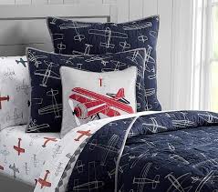 navy and white airplane quilted bedding