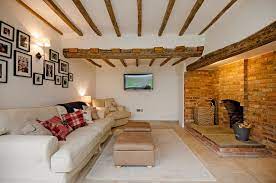 living rooms with ceiling beams