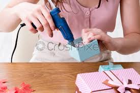 woman decorating gift box for special