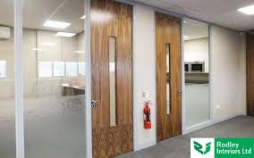 The compact closing mechanism reduces the impact a. Office Doors Solid Glass Laminate Doors Rodley Interiors