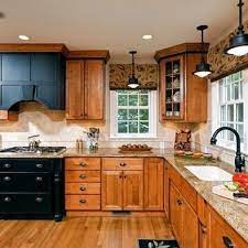 coordinate finishes with oak cabinets